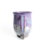 Tasse à anse motif fleurs