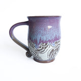 Tasse à anse motif fleurs